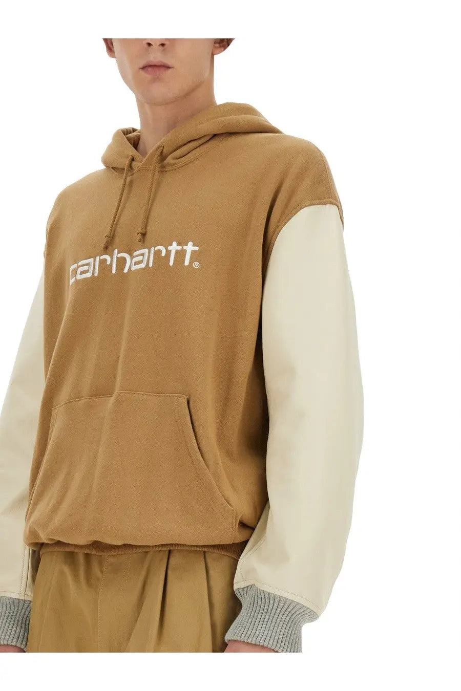 Tan and cream colorblock carhartt hoodie with contrasting sleeves and front pocket from junya watanabe man beige sweatshirt