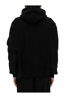 Black hooded Junya Watanabe Man Carhartt sweatshirt with relaxed fit and ribbed cuffs in cotton blend