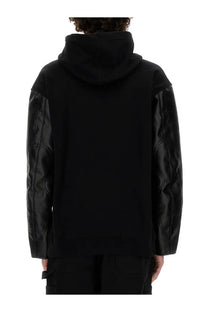 Black hoodie with glossy leather quilted sleeves junya watanabe man flap sweatshirt black