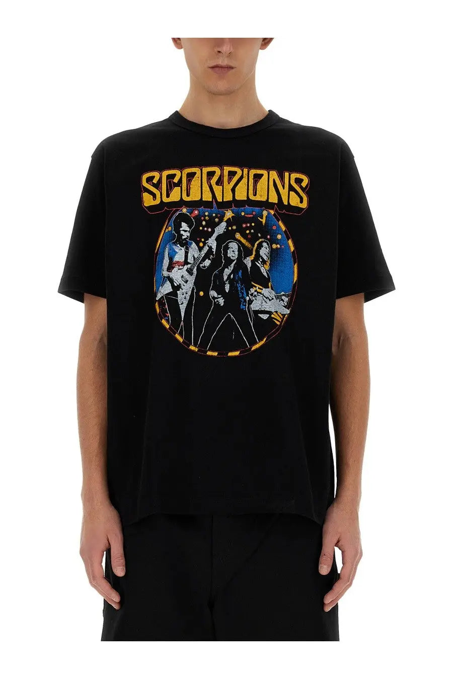 Black short-sleeved junya watanabe man shirt featuring vibrant scorpions band graphic with yellow lettering