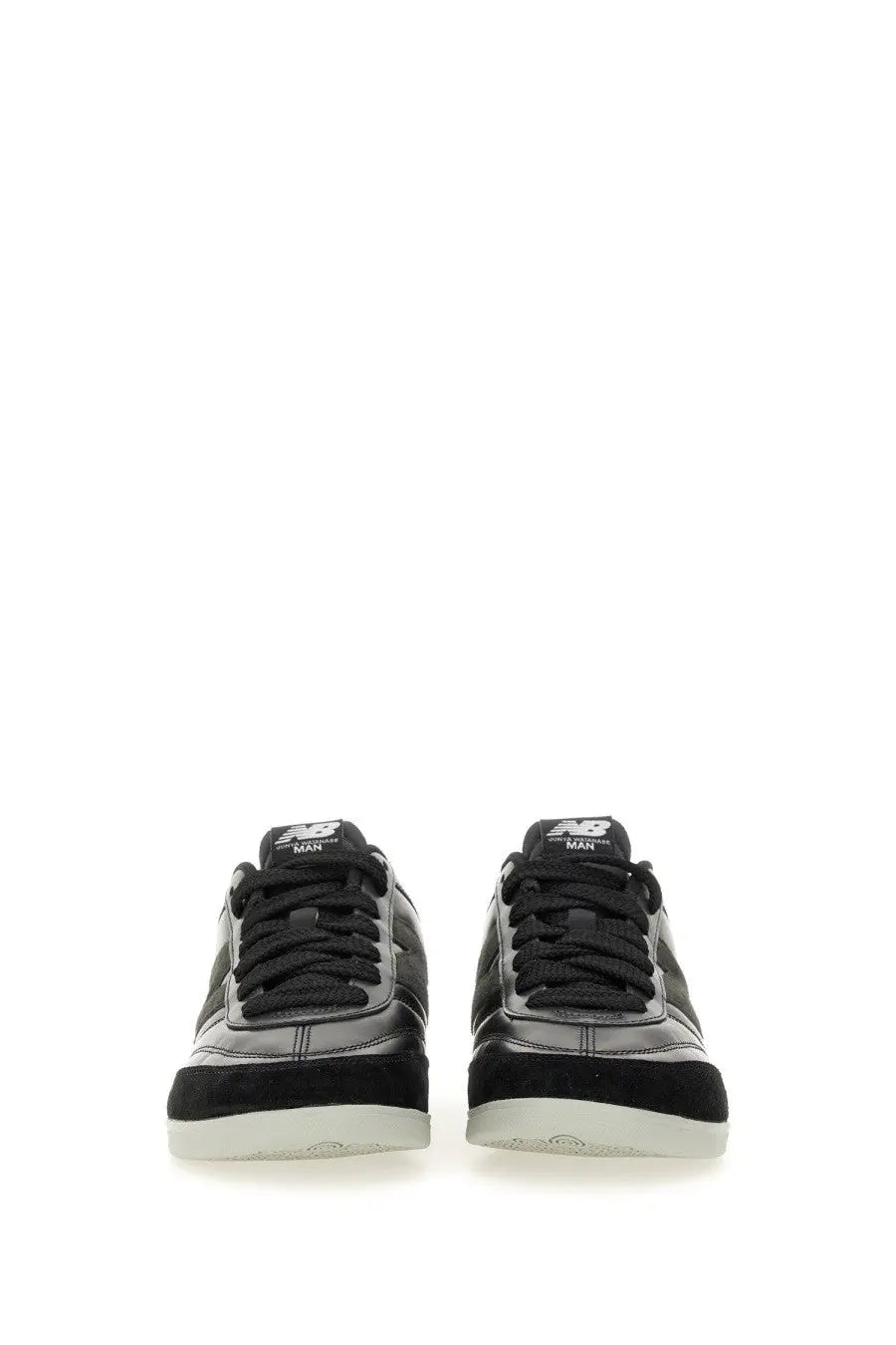Black new balance junya watanabe man men’s sneaker with glossy leather upper suede accents and white rubber soles