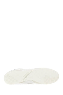 White rubber sole with circular tread patterns on junya watanabe man mens sneaker rc42 new balance white
