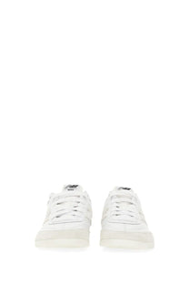 White new balance sneaker rc42 by junya watanabe man with clean minimalist design and subtle black tongue branding
