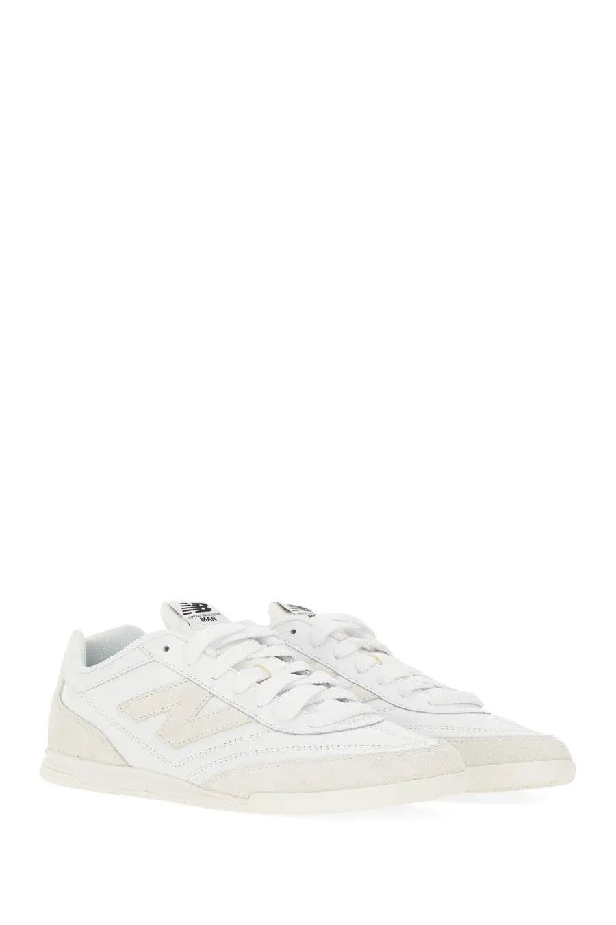White new balance junya watanabe man sneaker rc42 with minimalist design and beige logo and sole accents