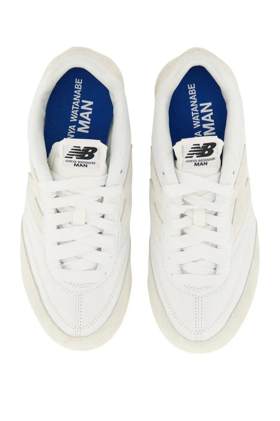 White new balance junya watanabe man sneaker rc42 with blue interior branding and clean minimalist design