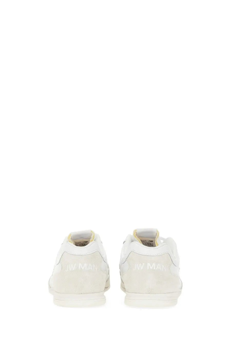 Back view of white suede low-top junya watanabe man sneaker with subtle maison margiela logo on the heel