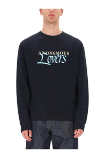 Jw anderson men’s black cotton sweatshirt with anonymous lovers printed in gold and light blue lettering on the chest
