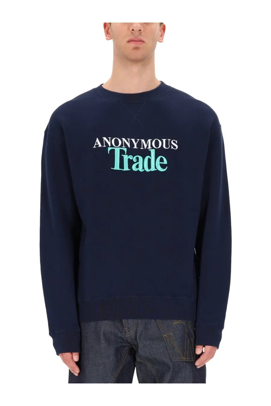 Navy blue JW Anderson men’s crewneck sweatshirt with anonymous trade print in white and teal across the chest