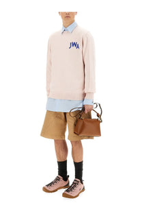 Tan leather mini handbag with braided handles featured in jw anderson men’s jersey blue product collection