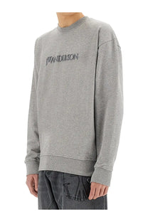 Jw anderson men’s heather gray long sleeve crewneck sweatshirt with wanderson embroidered in dark gray thread