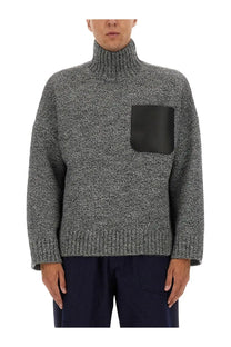 Jw anderson men’s gray turtleneck shirt in knit with textured fabric and contrasting black patch pocket