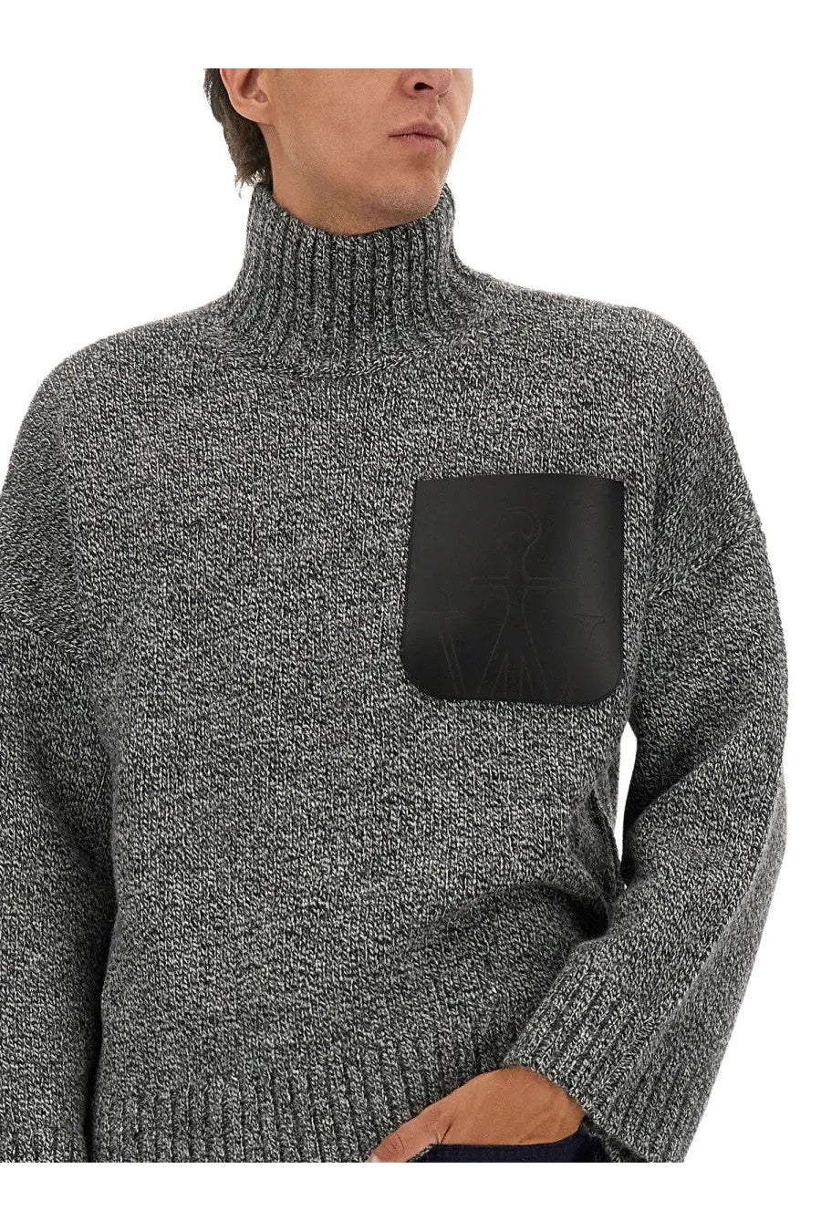 Jw anderson men’s gray textured turtleneck sweater with black leather patch pocket front view