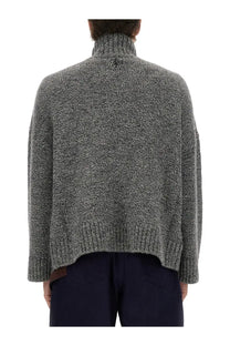 Jw anderson men’s textured gray knit turtleneck sweater with ribbed hem and cuffs made of knit fabric