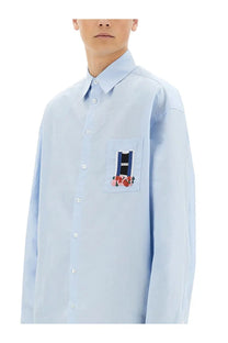 Jw anderson men’s light blue button-down window shirt with chest patch embroidered letter h and floral details
