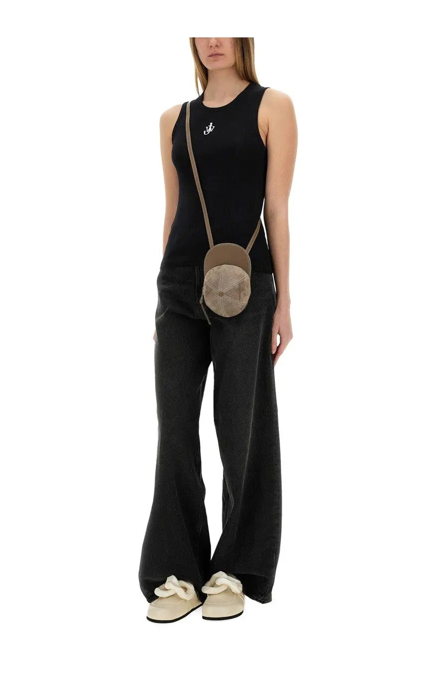 Jw anderson women’s anchor jwa tank top black paired with a beige suede round crossbody bag with adjustable strap