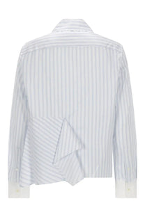 Jw anderson women’s asymmetrical shirt blue showing back with white and light blue stripes and ruffled detail