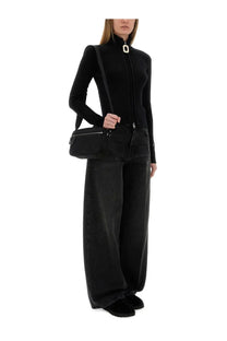Jw anderson women’s fitted cardigan black shown with a black crossbody bag featuring white oval clasp and silver zippers