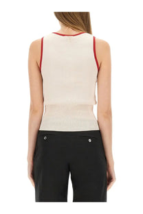 Jw anderson women’s knitted vest in cream ribbed knit sleeveless top with red trim on neckline and armholes