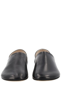 Jw anderson women’s black leather slip-on loafers with smooth polished finish and rounded toe