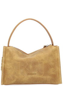 Jw anderson women’s loafer bag yellow in tan suede with single top handle and subtle stitching details