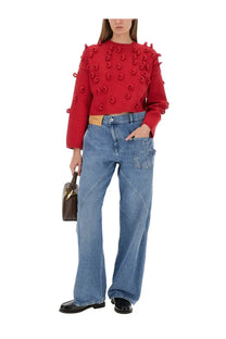 Jw anderson women’s loop cropped red knit sweater with textured circular pom pom embellishments on shoulders and sleeves