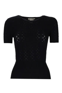 Black yves saint laurent short-sleeved knit top with subtle geometric perforated pattern in jw anderson style