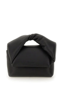 Jw anderson women’s twister bag black is a black leather handbag with a distinctive twisted top handle