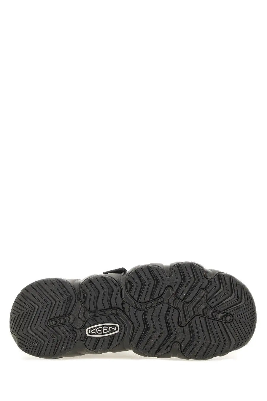 Back side of keen men’s clog hyperport multicolor showing black sole with chunky textured tread and brand logo on heel