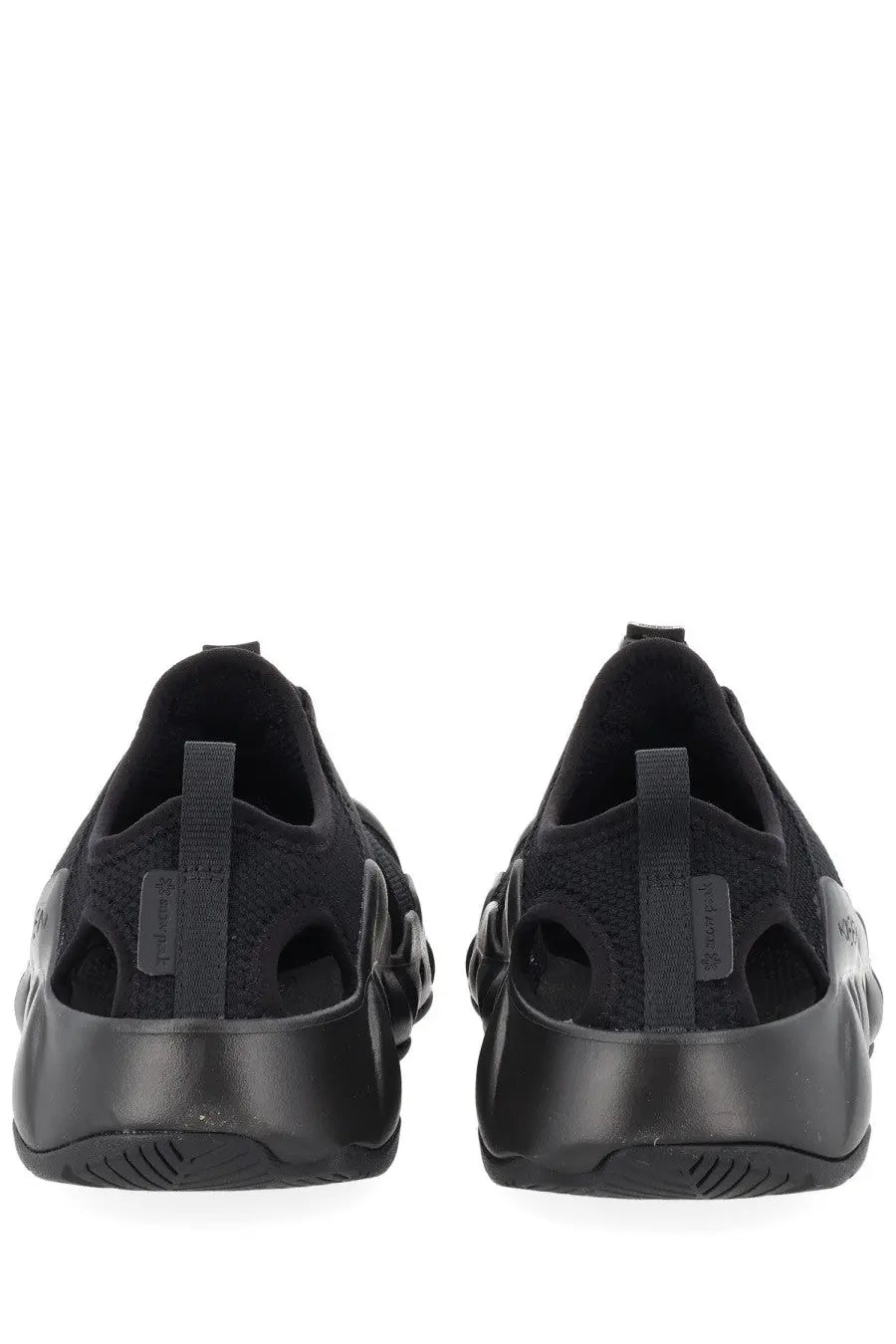 Black balenciaga triple s sneakers with a sleek textured knit upper and bold rubber sole for stylish wear