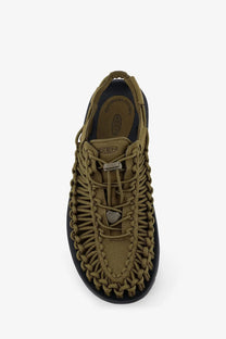 Keen men’s Uneek suede sneakers in olive green with braided canvas upper black rubber sole and metallic logo accents