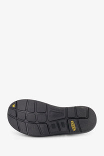 Back side of keen men’s uneek woven fabric sandals black showing black rubber sole with textured grid tread and yellow logo