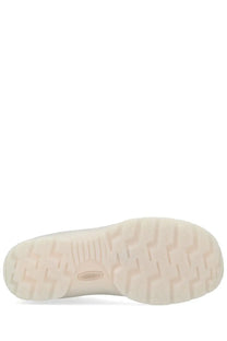 Cream-colored rubber sole with zigzag tread and embossed keen logo on women’s jasper se1 sneaker white