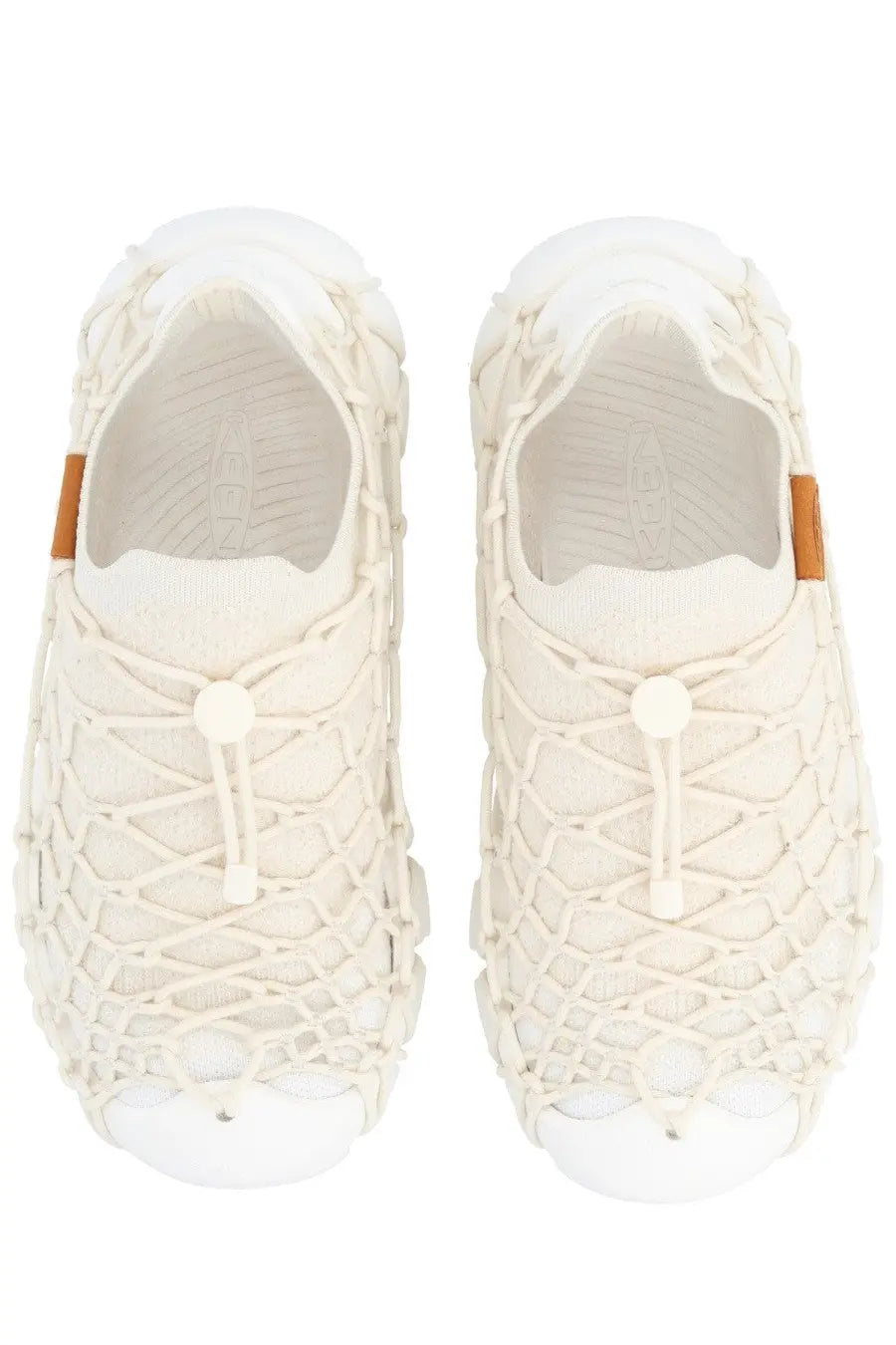 Keen women’s sneaker Uneek white cream-colored mesh with knitted net-like upper and white rubber soles