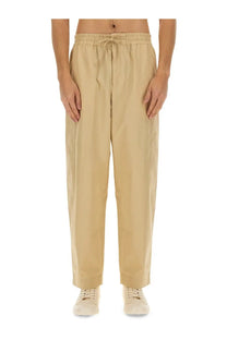 Kenzo men’s beige cargo jogging pants with relaxed fit and subtle vertical seam detailing