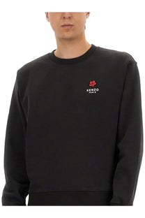 Kenzo men’s classic black sweatshirt with red floral logo and white kenzo paris text embroidered on left chest