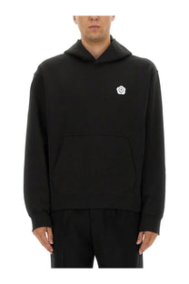 Kenzo men’s black hooded sweatshirt with small white embroidered logo on the chest made of soft fabric