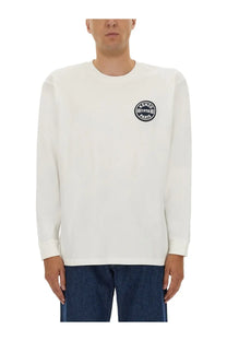 Kenzo men’s white long sleeved crewneck sweatshirt with black circular kenzo paris 1970 logo on left chest