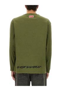 Kenzo men’s relaxed fit olive green long-sleeved t-shirt with red logo patch and black handwritten text on hem