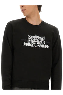 Kenzo men’s slim fit black sweatshirt with bold white tiger graphic peeking over the chest