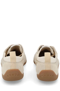 Kenzo men’s kenzo striker sneaker pink beige suede with tan rubber sole and matching pull tabs visible from the back
