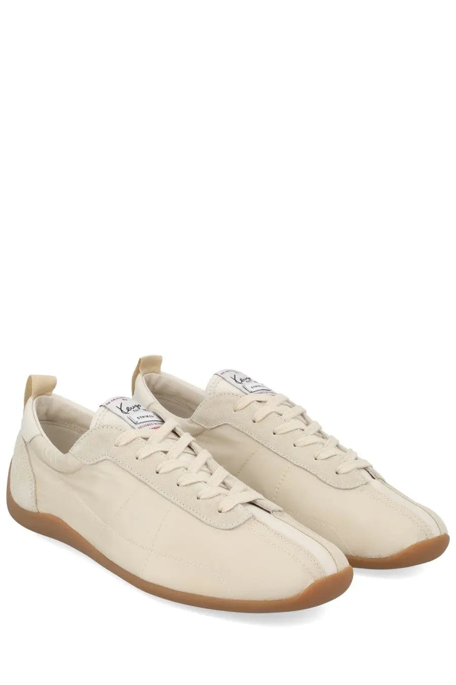 Kenzo men’s kenzo striker sneaker pink in cream-colored suede with tan rubber sole white laces and minimalist design