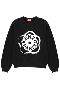 Kenzo women’s black sweatshirt featuring a bold white floral logo with stylized brand lettering on front