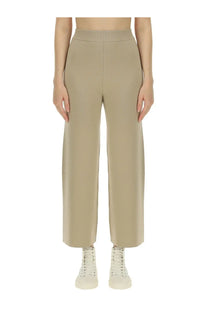 Beige high-waisted wide-leg trousers by Kenzo for women in smooth tailored fabric perfect for formal wear