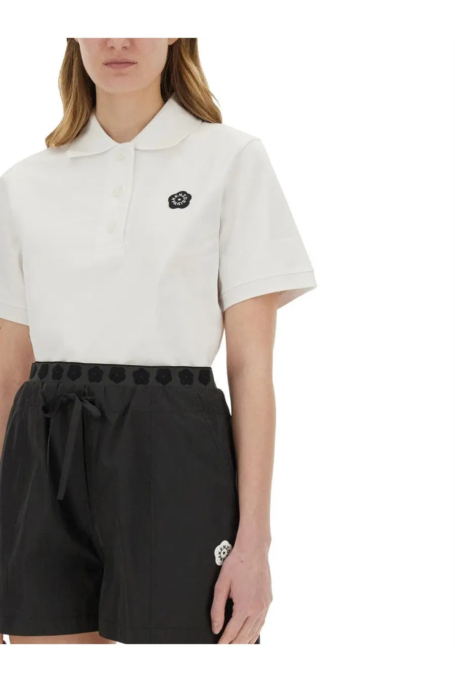 Kenzo women’s white short-sleeved polo shirt with black embroidered boke flower logo on the chest