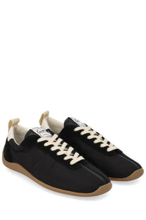 Kenzo women’s kenzo striker sneaker black with cream laces tan rubber sole minimalist black canvas design