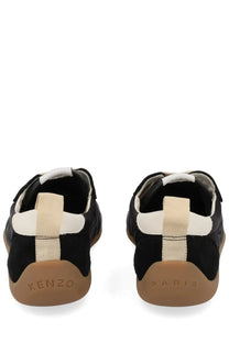Kenzo women’s Kenzo striker sneaker black suede with cream-colored velcro straps and rubber soles front view