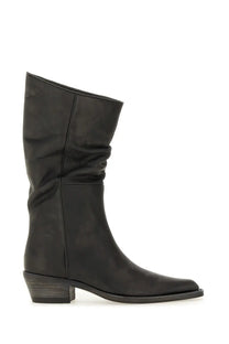 Khaite women’s black suede ankle boot clive with slightly flared shaft and low block heel front view
