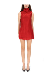 A vibrant red sleeveless mini dress with a high neck and subtle pleats at the hem by Khaite women