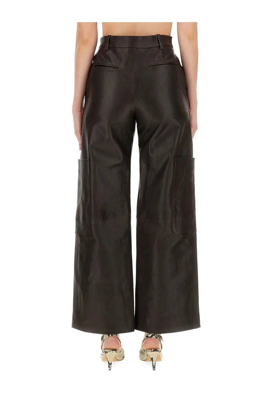 Khaite women’s black faux leather cargo pants with wide legs and large side pockets in the caiton brown style