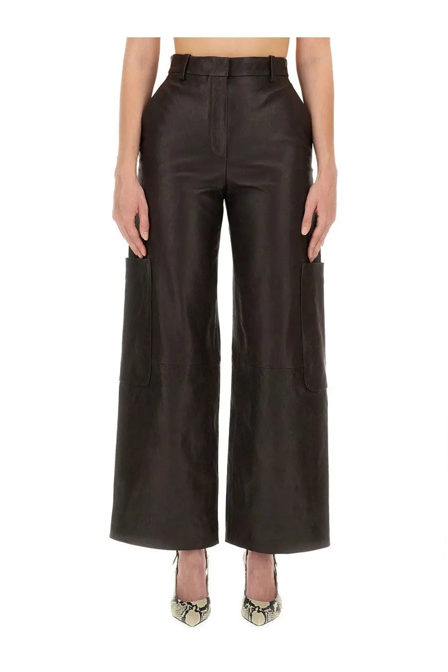 Khaite women’s black leather cargo pants with wide legs and side pockets in a back view